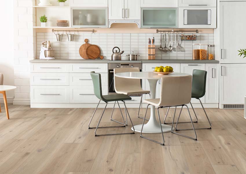 wood look vinyl flooring in kitchen with white backsplash 